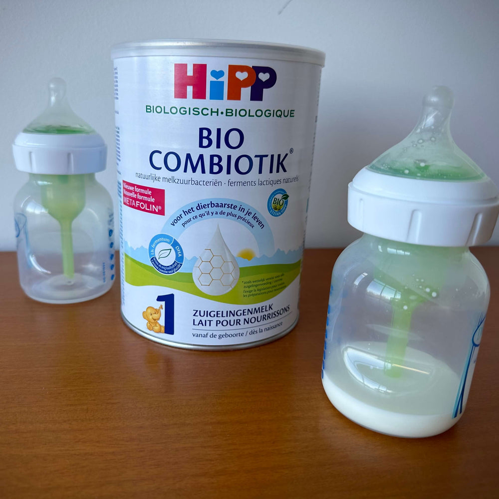 Two European baby formula boxes side by side for comparison